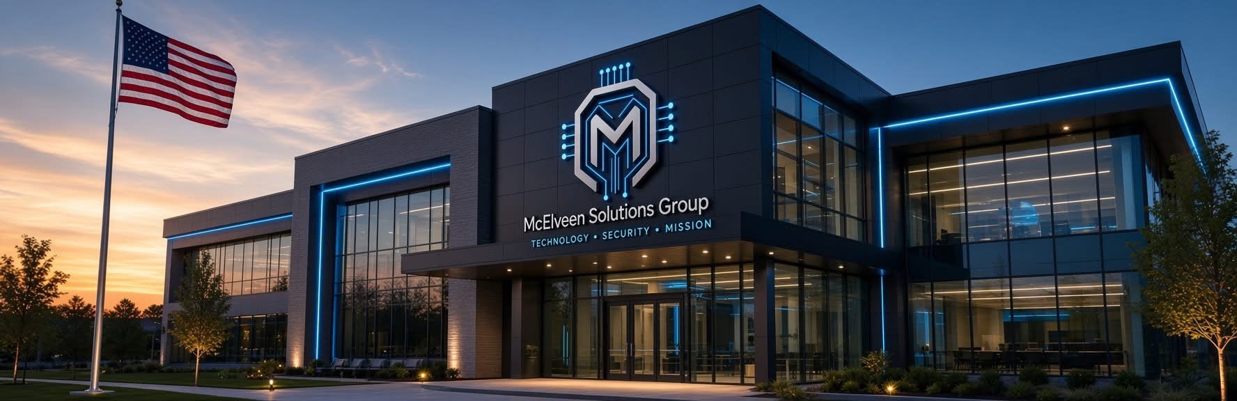 McElveen Solutions Group office building with MSG signage and blue exterior lighting at sunset